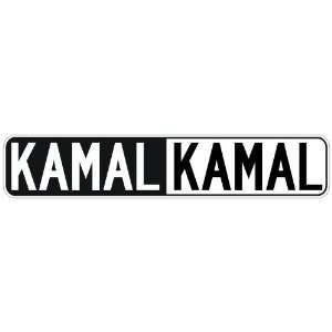   NEGATIVE KAMAL  STREET SIGN