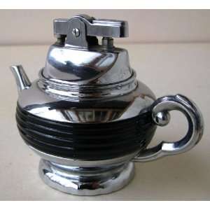   Art Deco Tea Pot Fluid Table Lighter. Circa 1940.