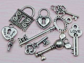 16 pieces of silver toned zinc alloy charm pendants in 8 designs as 