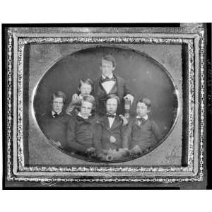   Cattell,holding large Bible,with five page boys
