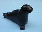 sea lion carving black stone canada eskimo art returns not