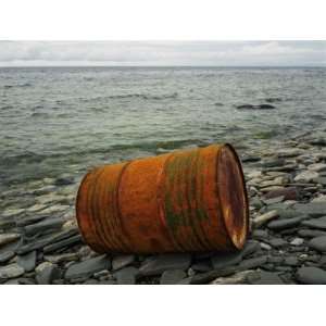 Rusty Oil Barrel on a Stony Shore, Gotland, Sweden Photographic 