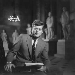 Senator John F. Kennedy Seated in Museum W. Statues Photographic 