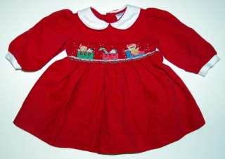 description here is a beautiful girls smocked christmas dress from 