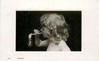REAL PHOTO CUTE LITTLE GIRL BLOWING BUBBLES MAILED 1907 R47391  