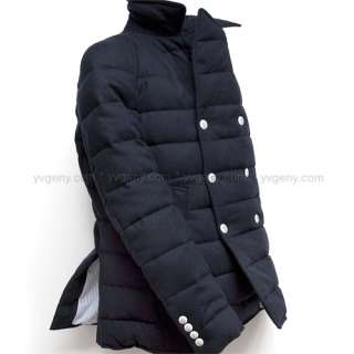 The coat features Moncler Gamme Bleu branding — a blue and off white 