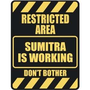   RESTRICTED AREA SUMITRA IS WORKING  PARKING SIGN