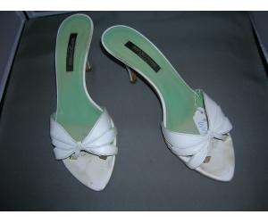 SERGIO ROSSI white leather sandals. shoes have open rounded toe, and 