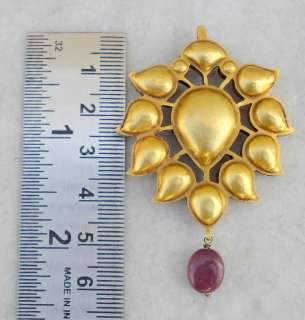 Material   20 carat yellow gold & original old gemstones piece.