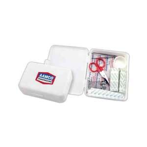  First aid kit with rolls of gauge bandages, cotton roll 