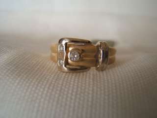   You are looking at a Fine Gold with Diamond Ladies Buckle Ring