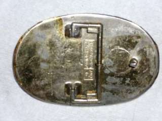 For Consideration  A pre owned Kiss Vintage 1977 belt buckle 