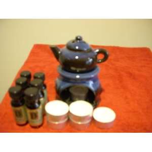 Tea Kettle Oil Warmer with a 6 pack of oils and 6 pack of tealights 