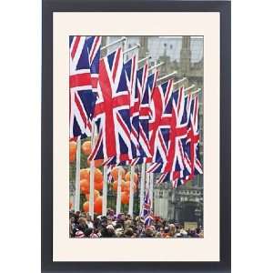  Union flags and spectators outside Houses of Parliament 