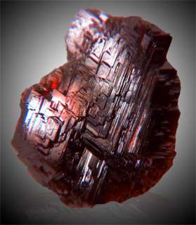 Translucent gem crystal with a s uperb blood red color