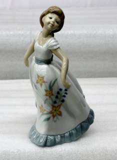 NAO by Lladro handcrafted porcelain figurine  Floral Spirit  design 