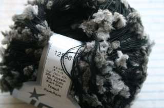 1sk ICE Carry along yarn black with gray pom poms 259yd  