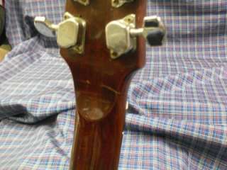 Up for auction, is a vintage EKO acoustic guitar.