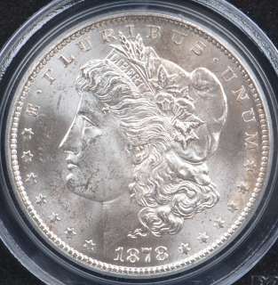 This is a 1878 CC Morgan Silver Dollar graded and authenticated by 