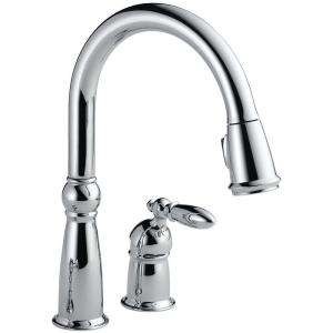   Pull Down Sprayer Kitchen Faucet in Chrome featuring MagnaTite Docking