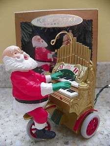   1994 Santas Sing Along Magic Light and Music Christmas Ornament