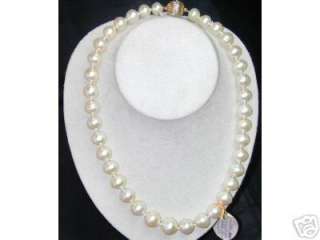   baroque pearl necklace with diamond 14K yellow gold ball shaped clasp