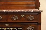 Richly carved of solid walnut during the late Victorian or Eastlake 