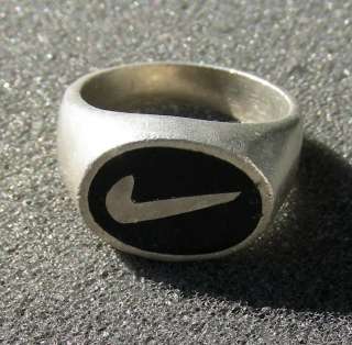   ¼   9 ½ (19mm) sterling silver ring w/onyx and Nike logo  